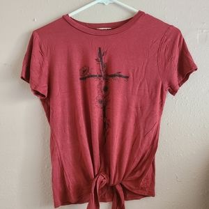 Small redish shirt that can tie in the front